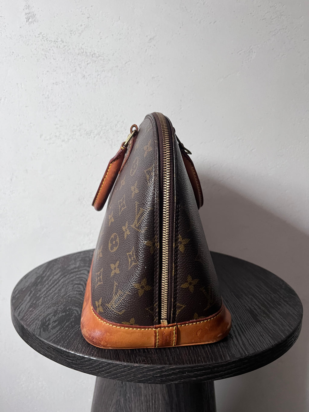 Louis Vuitton Alma Monogram Handbag Brown