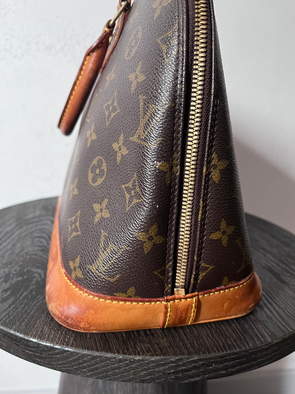 Louis Vuitton Alma Monogram Handbag Brown