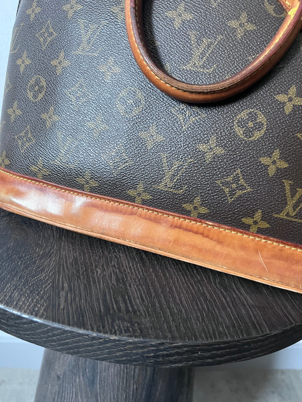 Louis Vuitton Alma Monogram Handbag Brown