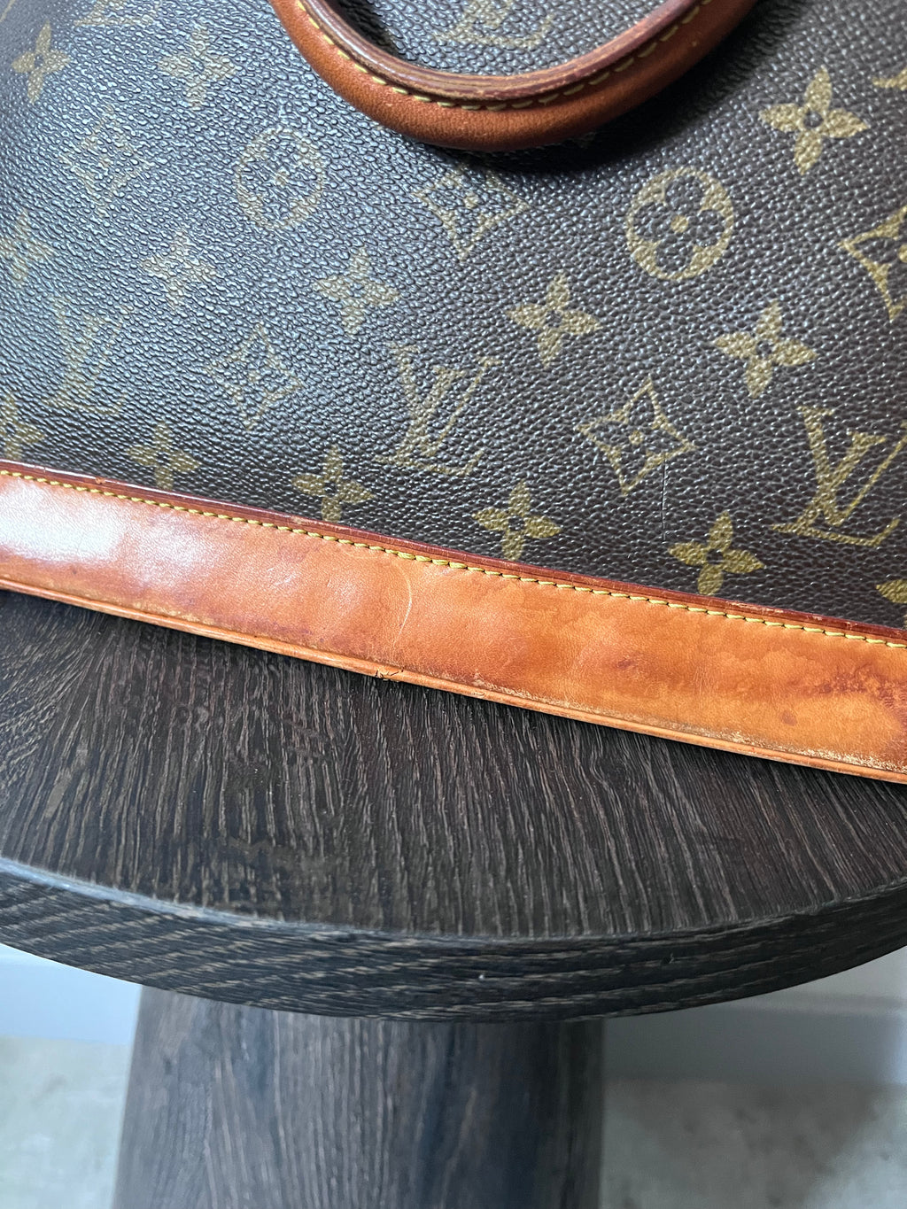 Louis Vuitton Alma Monogram Handbag Brown