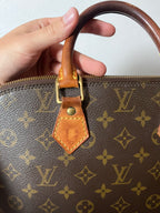 Louis Vuitton Alma Monogram Handbag Brown