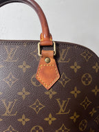 Louis Vuitton Alma Monogram Handbag Brown