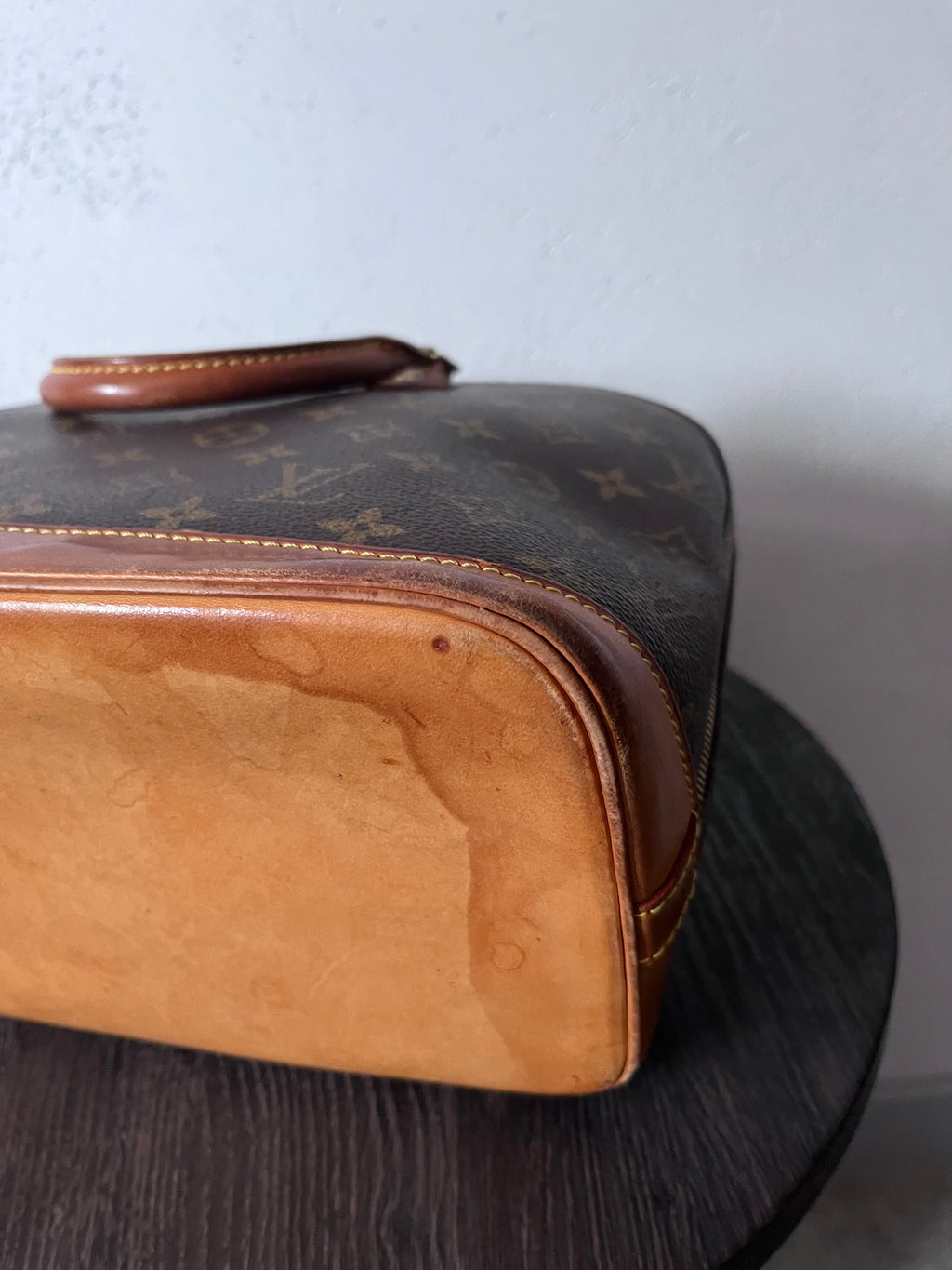 Louis Vuitton Alma Monogram Handbag Brown
