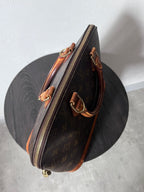 Louis Vuitton Alma Monogram Handbag Brown